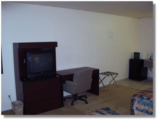 Executive Inn By Oyo Queenville Mena Habitación foto