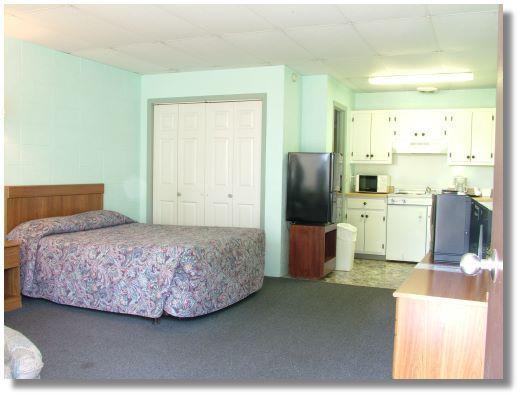 Executive Inn By Oyo Queenville Mena Habitación foto