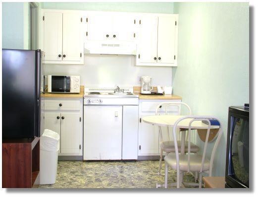 Executive Inn By Oyo Queenville Mena Habitación foto
